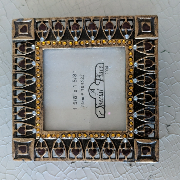 Small metal picture frame with golden stones. Glass/picture size 1 5/8" x 1 5/8" - Picture 1 of 9